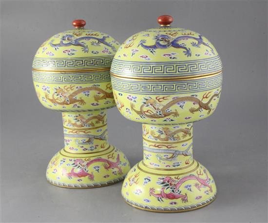 A pair of Chinese yellow ground altar vessels and covers, dou, iron red Daoguang seal marks and of the period (1821-50), height 27.5cm,